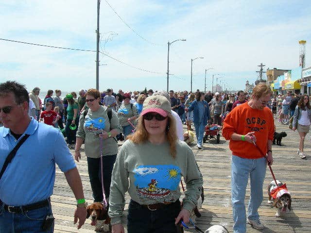 Debbie and Uncle Kevin with Precious waddle on the boardwalk